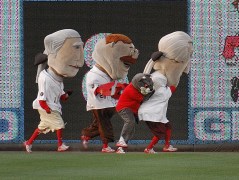 Panther "That Cat" tackles Thomas Jefferson during the Nationals Presidents Race