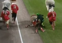 Teddy Roosevelt is tackled by a Leprechaun