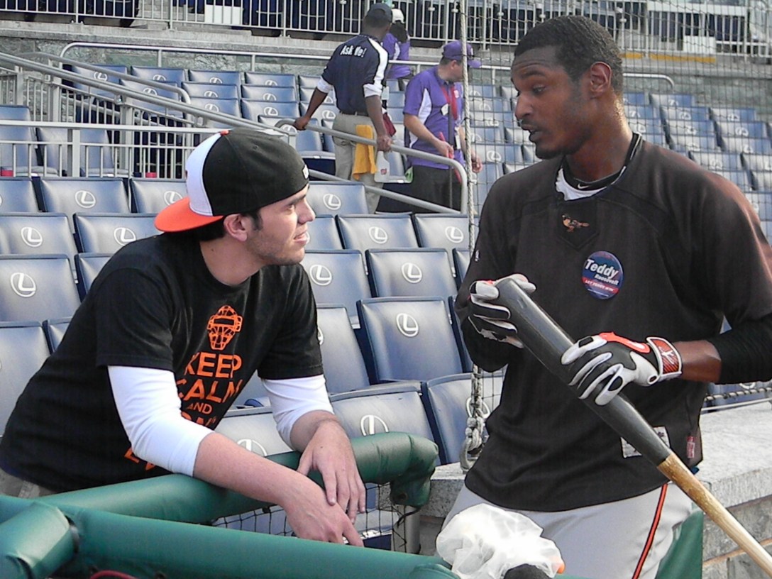 Orioles Adam Jones supports Teddy Roosevelt in the Washington Nationals Presidents Race by wearing a Let Teddy Win button