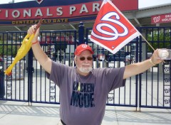 Washington Nationals Rubber Chicken Man Hugh Kaufman displays his Chicken Mode T-Shirt
