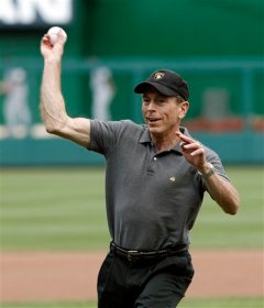 David Petraeus throws out the first pitch at Nationals Park on Military Appreciation Day September 9, 2012 (AP)