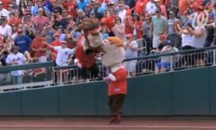 Abe Lincoln leaps from the stands to tackle Teddy Roosevelt in the Washington Nationals Presidents Race