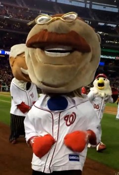 Teddy Roosevelt wearing boxing gloves