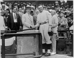 Calvin Coolidge poses with Walter Johnson at Griffith Stadium