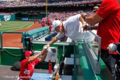 Rubber Chicken Man Hugh Kaufman delivers chicken soup to a recovering Ian Desmond